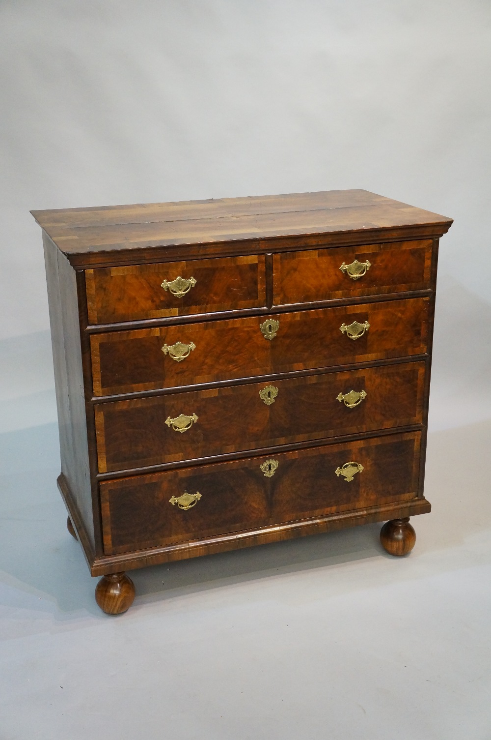 A William & Mary style walnut veneered c