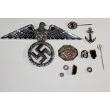 A chromium plated Nazi badge, 17 cm wide