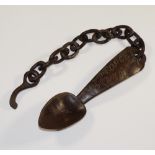 A Welsh love spoon and chain with tapere