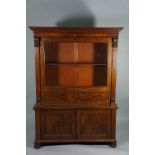 A Victorian mahogany bookcase the flared