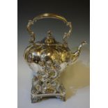 A Victorian silver plated tea kettle on