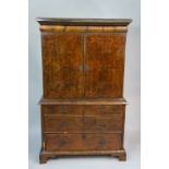 A William & Mary walnut veneered cabinet