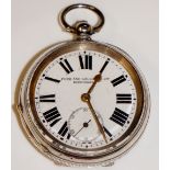 A silver fob watch with engine turned case the white enamel dial with Roman numerals and subsidiary