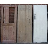 Four Victorian painted and stripped doors, brown painted example,