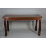 A reproduction mahogany serving table in Chippendale style the rectangular top above a frieze with