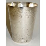 A Persian beaker of tapered cylindrical form finely engraved with trailing leafy bands to the top