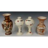 A Japanese hexagonal panelled baluster vase with pair of gilt handles,