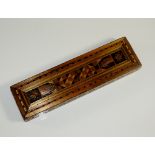 A 19th Century straw-work pen box of rectangular outline the top with central panel of geometric