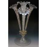 A four flute epergne engraved with flowers and foliage, frilled upper rims, inset metal fittings,