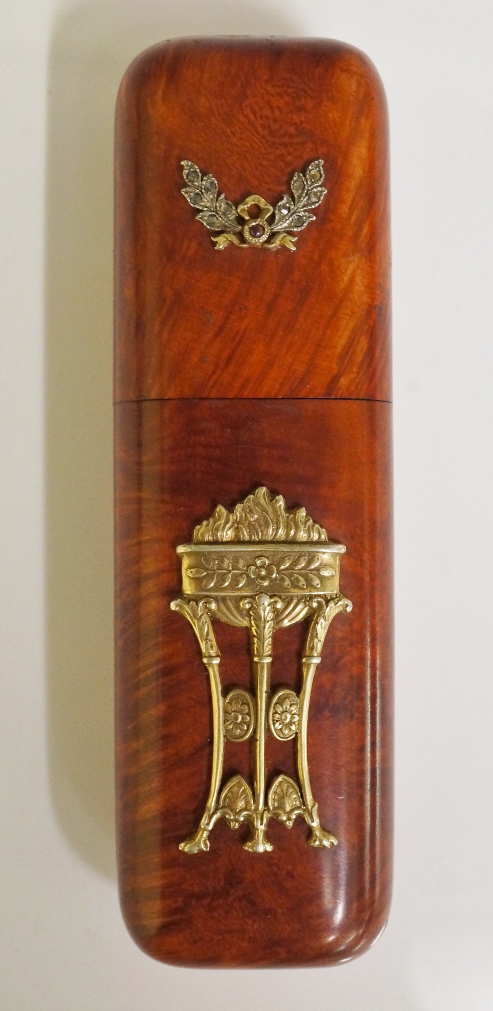 A Russian Second Kokoshnik Period stained karelian birch cigar tube the front and back applied to