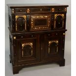 An English 17th Century chest inlaid overall in bone and mother of pearl the flared top above one