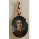 An 18th Century gold framed portrait miniature of a young gentleman, indistinctly initialled CM, 3.