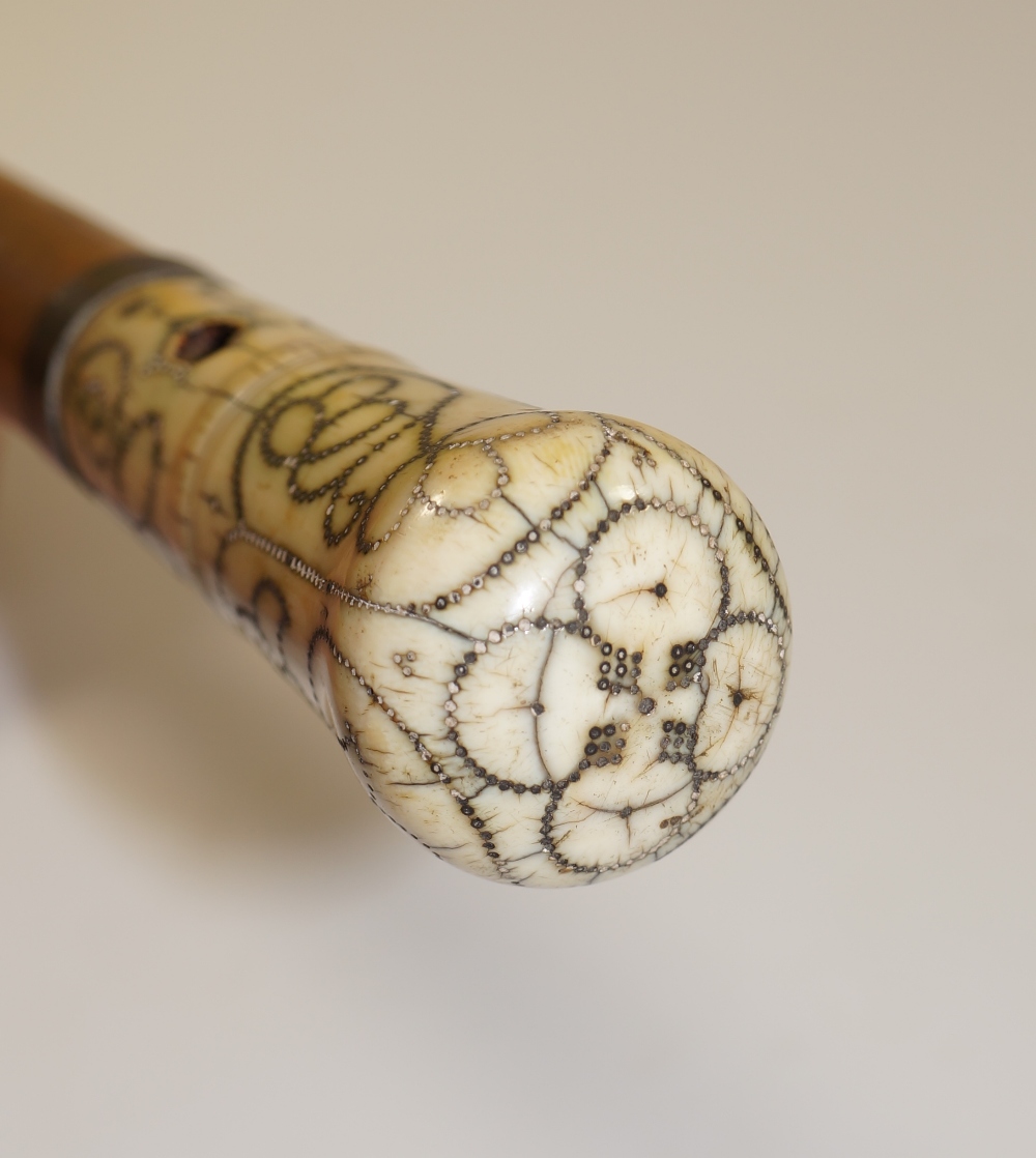 An 18th Century ivory handled piqué inlaid walking stick with stylised scrolling foliate decoration, - Image 3 of 3