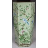 A Chinese Famille Verte hexagonal stick stand decorated overall with birds amidst flowers and