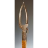 An early 20th Century general store 'grabber', iron claw-shaped hook,