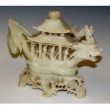 A Chinese soapstone dragon boat,