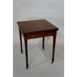 An Edwardian mahogany envelope top card table, boxwood strung, the frieze fitted one single drawer,