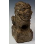 A carved stone figure of a kylin,