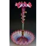 A Victorian cranberry opalescent single flute epergne, edges frilled,