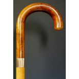 A George V Malacca walking cane with crook handle the 9 carat gold collar inscribed J.