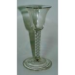 A George III air twist stem glass with spreading conical bowl and double air twist stem,