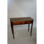 A George IV mahogany tea table the rounded rectangular top with deep panelled frieze,