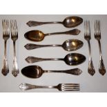 Five tablespoons and five matching table forks with palmette cast terminals, stamped .