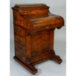 A Victorian burr walnut veneered pop-up Davenport the top with brass three quarter gallery hinged