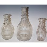 Two Regency mallet shaped decanters, ringed necks and faceted cut bodies, one 24cm high,