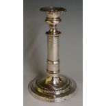 A George III telescopic table candlestick, gadrooned and geometric engraved borders,