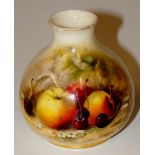 A Royal Worcester compressed bottle shaped vase, still life painted with apples,