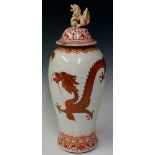 A Chinese porcelain baluster vase and cover painted to the body  in iron red and gilt with The