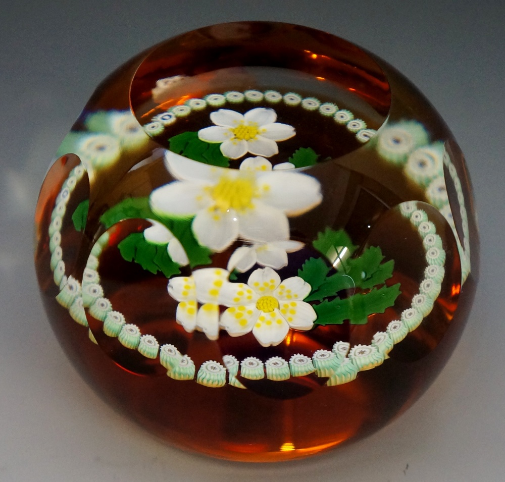 A Caithness paperweight featuring a wood anemones design, numbered 28 of 50, 6cm high, 7.