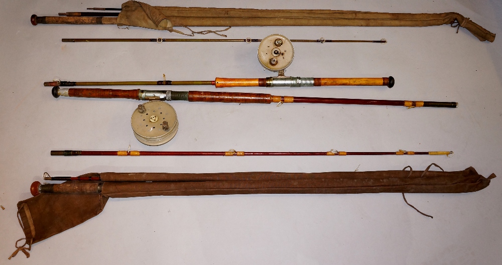 Four various fishing rods, two with reels,