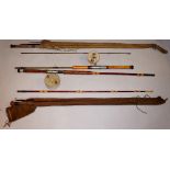 Four various fishing rods, two with reels,
