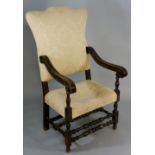 A 19th Century Italian stained beech armchair with cartouche shaped back,