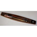 A novelty gondola and three oar- shaped early nibbed pens, each oar bearing coat of arms,