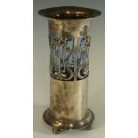 Scottish School - a cylindrical vase with everted rim the body pierced with sinuous flower heads