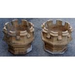 A pair of buff stoneware castellated top chimney crowns, 50cm wide,