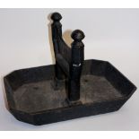 A cast iron boot scraper with canted rectangular base and cast U-shaped scraper, 31cm wide,