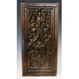 Two Gothic oak panels one with trefoils and tracery the other similar with shield,