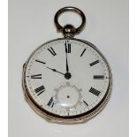 A silver fob watch with white enamel dial with Roman numerals and subsidiary seconds dial,