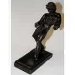 A bronze figure after the Antique of a naked male carrying a pigskin, 11.