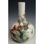 A Chinese bottle shaped vase with tall neck the white body finely painted with birds amidst prunus