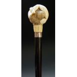 A Japanese erotic walking stick the ivory terminal as pair of conjoined female figures,