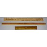 A set of three rulers, the largest wood and ivorine, stamped 'Trade "Stanley" Mark London, F.