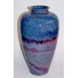 A Chinese  blue to purple flambé glazed vase of tapered form with shallow everted neck,