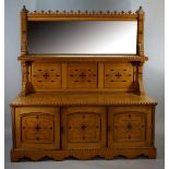 A Victorian pale oak mirror back sideboard of Gothic design the top with geometric trefoil gallery