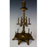 An 18th Century brass sewing stand the tall column with cylindrical nozzle with broad drip pan,