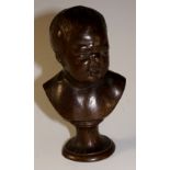 A miniature bronze head and shoulder of crying infant, the back inscribed "Sauvage Frère",
